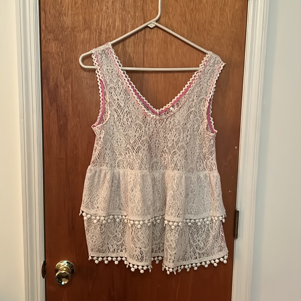 Free people lace tank ,really pretty and and delicate looking .
